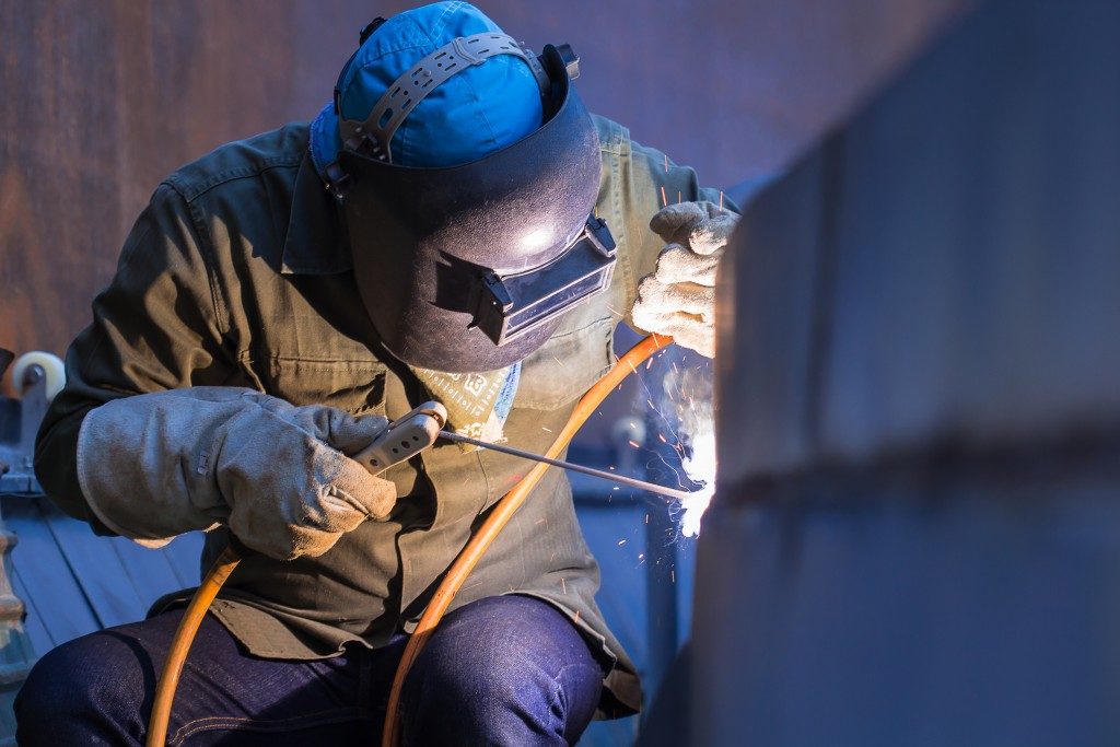 Man welding a metal