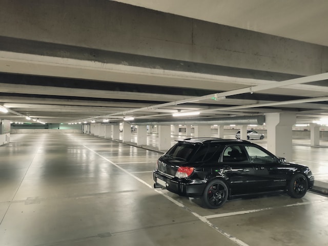 black car in a parking space